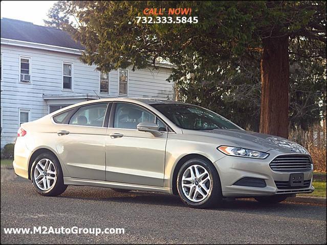 used 2015 Ford Fusion car, priced at $5,900