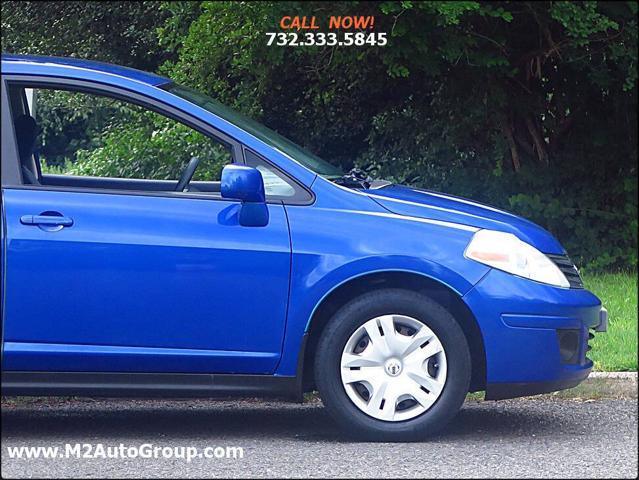 used 2010 Nissan Versa car, priced at $4,200