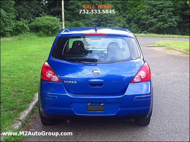 used 2010 Nissan Versa car, priced at $4,200