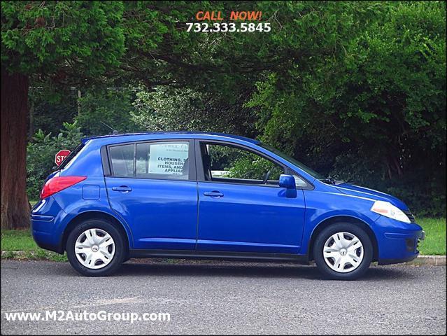 used 2010 Nissan Versa car, priced at $4,200