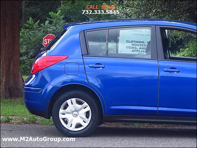 used 2010 Nissan Versa car, priced at $4,200