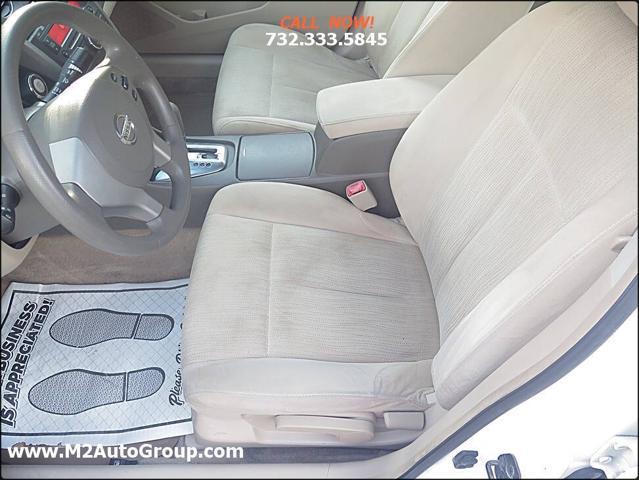 used 2010 Nissan Altima car, priced at $4,900