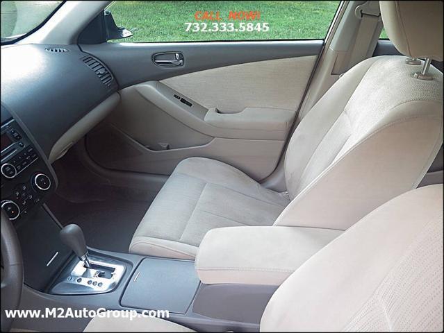 used 2010 Nissan Altima car, priced at $4,900
