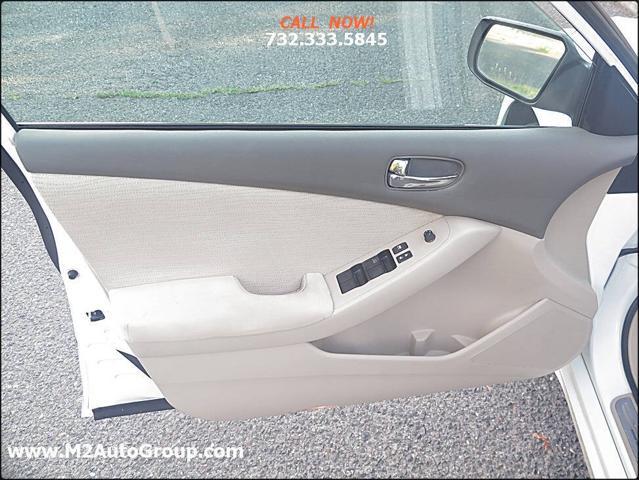 used 2010 Nissan Altima car, priced at $4,900