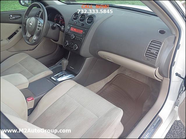 used 2010 Nissan Altima car, priced at $4,900