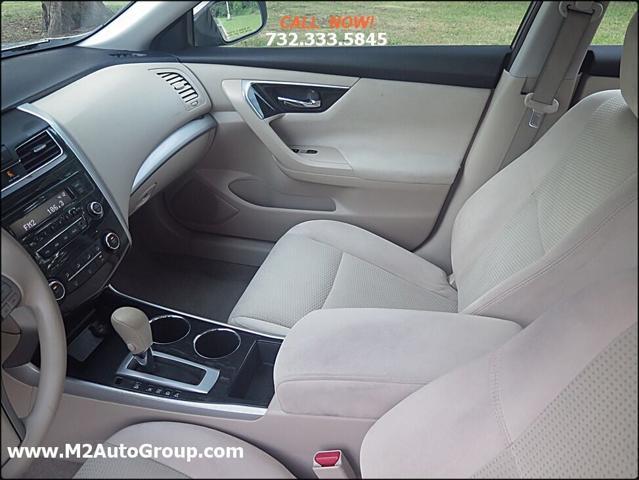 used 2014 Nissan Altima car, priced at $5,400