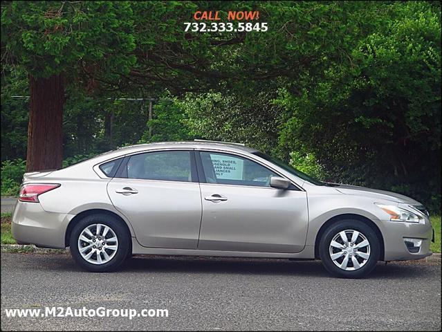 used 2014 Nissan Altima car, priced at $5,400