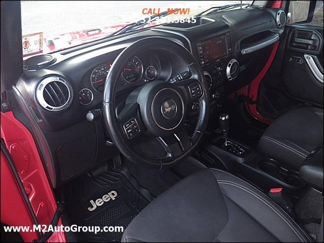 used 2015 Jeep Wrangler Unlimited car, priced at $15,900