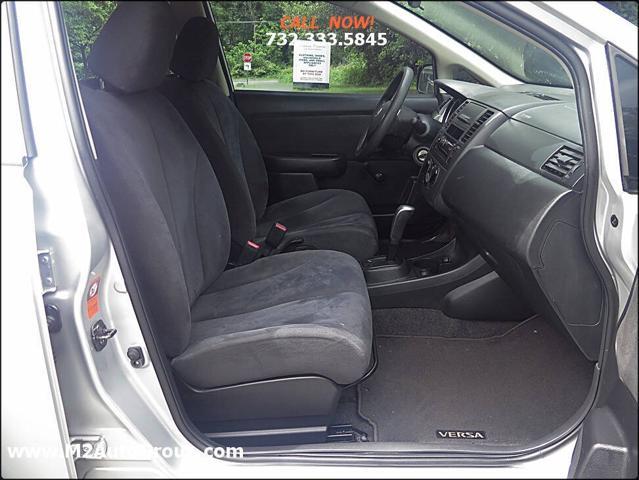 used 2009 Nissan Versa car, priced at $4,600