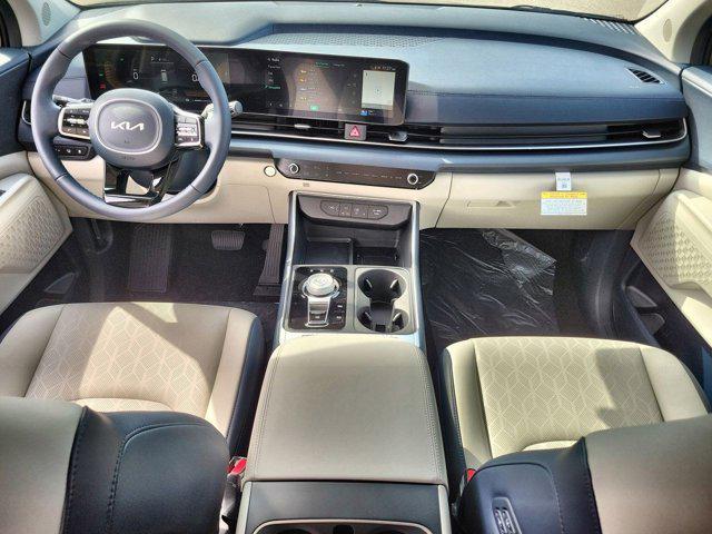 new 2025 Kia Carnival Hybrid car, priced at $43,002