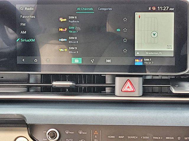 new 2025 Kia Carnival Hybrid car, priced at $43,002