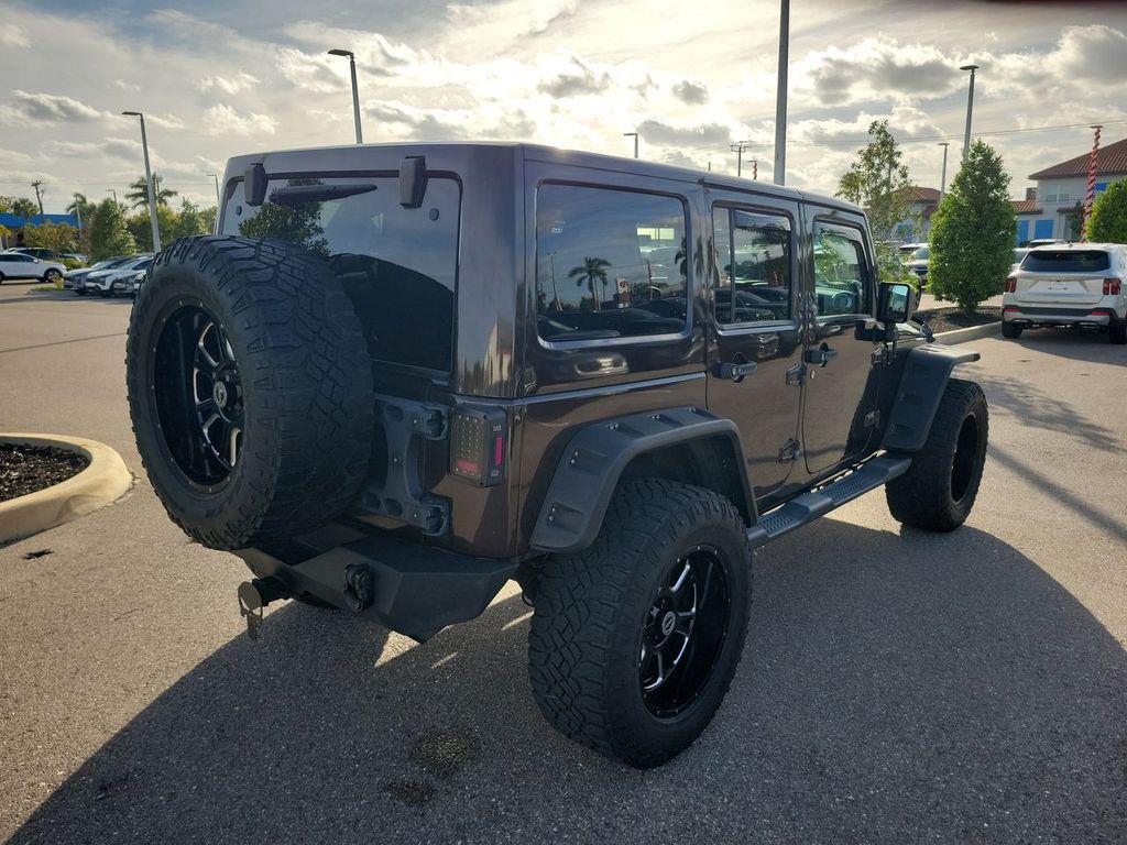 used 2013 Jeep Wrangler Unlimited car, priced at $16,799