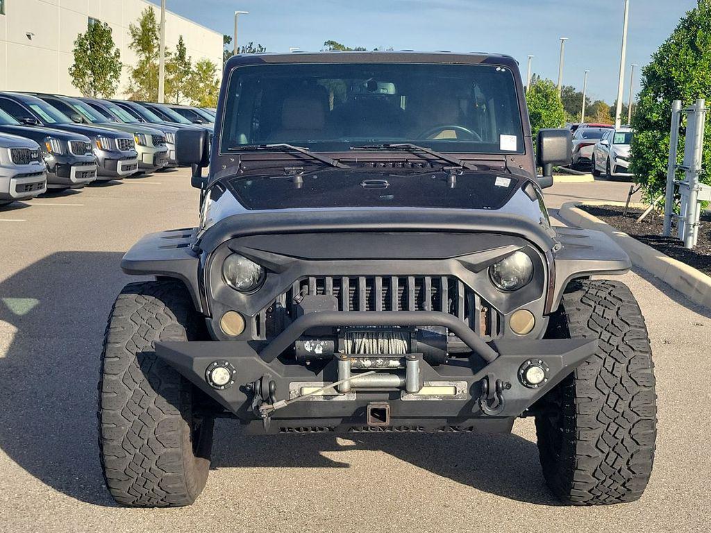 used 2013 Jeep Wrangler Unlimited car, priced at $16,799