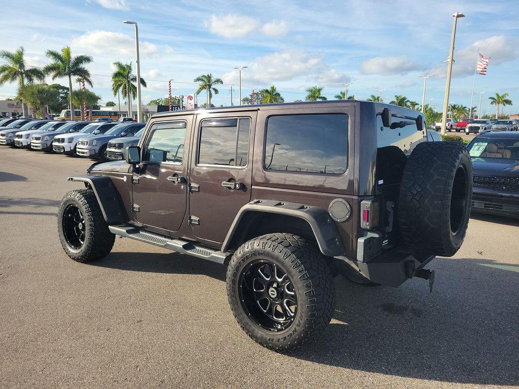 used 2013 Jeep Wrangler Unlimited car, priced at $16,799