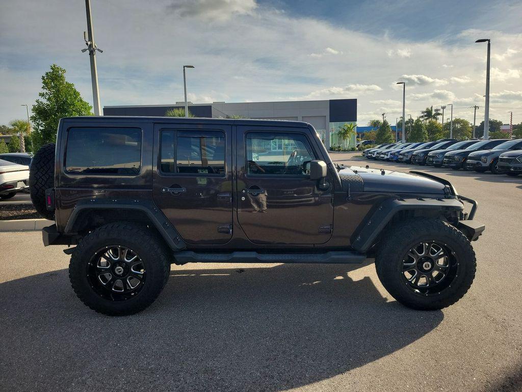 used 2013 Jeep Wrangler Unlimited car, priced at $16,799