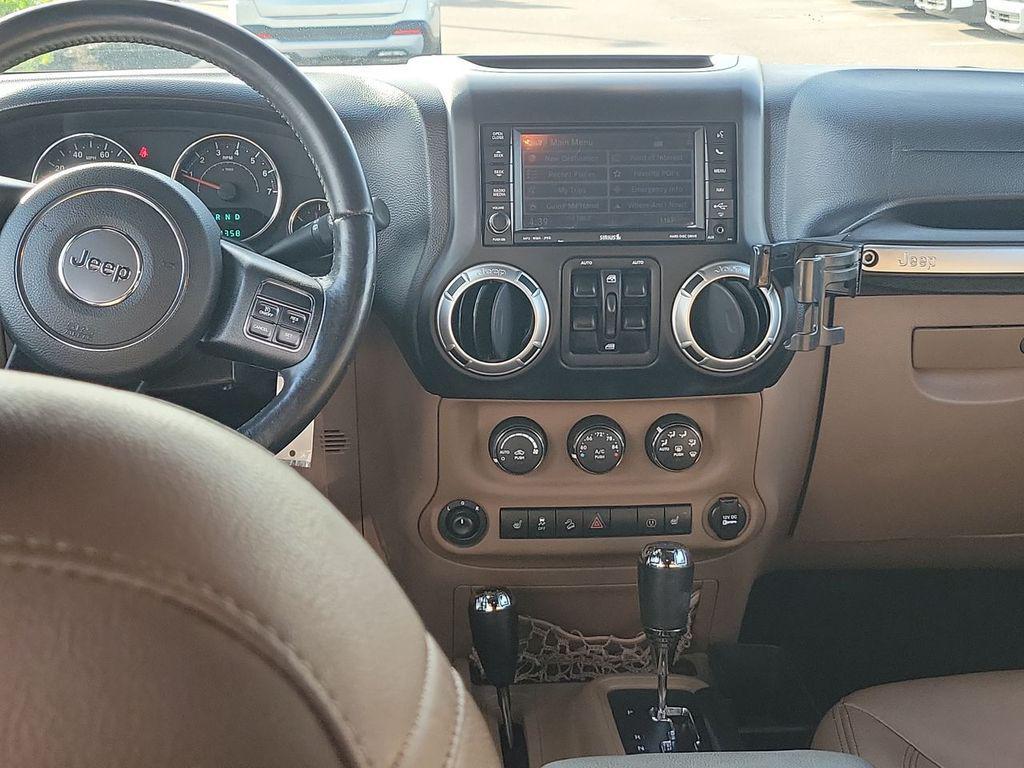 used 2013 Jeep Wrangler Unlimited car, priced at $16,799