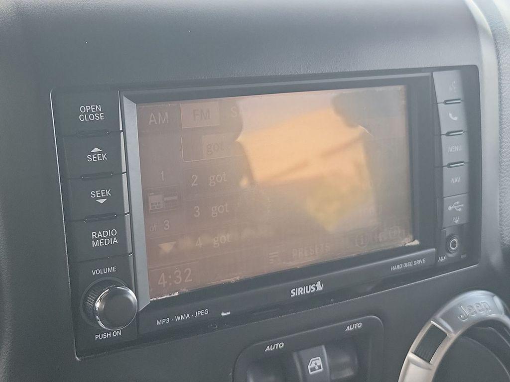 used 2013 Jeep Wrangler Unlimited car, priced at $16,799