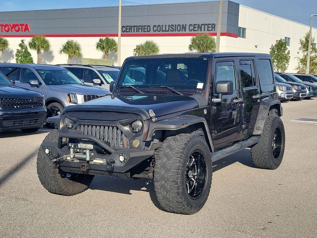 used 2013 Jeep Wrangler Unlimited car, priced at $16,799