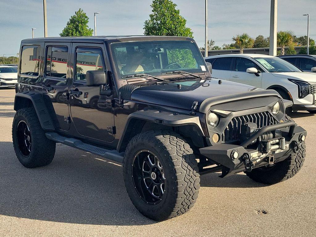 used 2013 Jeep Wrangler Unlimited car, priced at $16,799