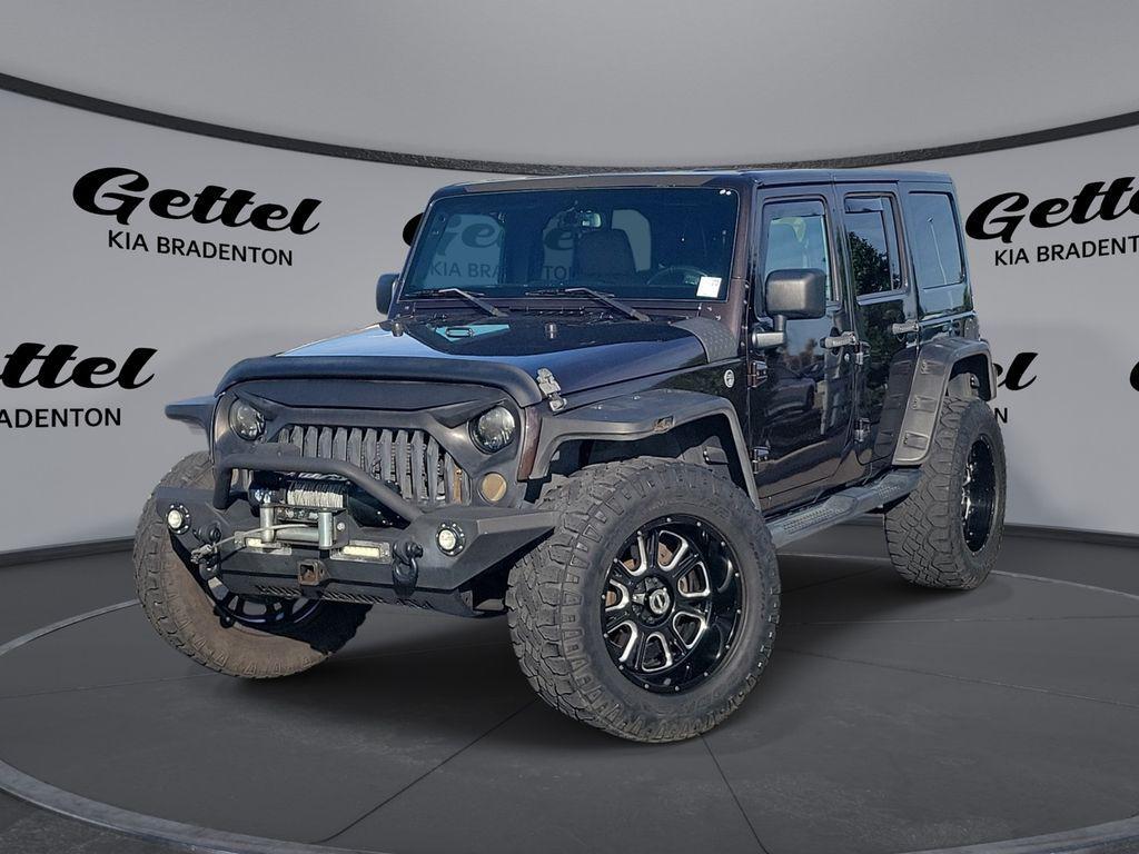 used 2013 Jeep Wrangler Unlimited car, priced at $16,799