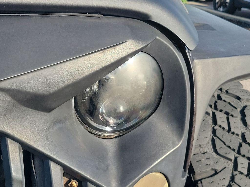 used 2013 Jeep Wrangler Unlimited car, priced at $16,799