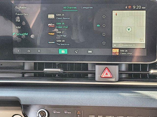 new 2025 Kia Carnival Hybrid car, priced at $43,472