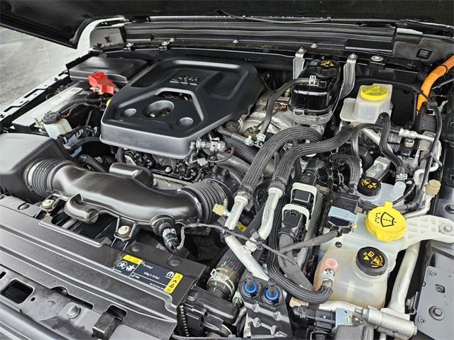 used 2023 Jeep Wrangler 4xe car, priced at $31,852