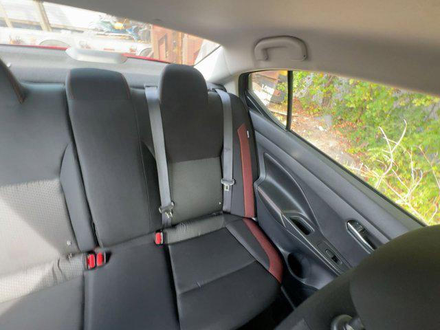 used 2024 Nissan Versa car, priced at $15,045