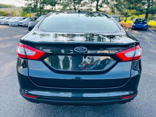 used 2014 Ford Fusion car, priced at $7,500
