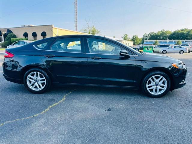 used 2014 Ford Fusion car, priced at $7,500