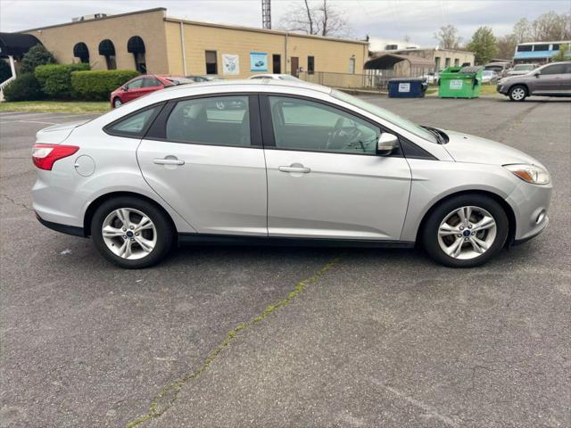 used 2014 Ford Focus car, priced at $5,000