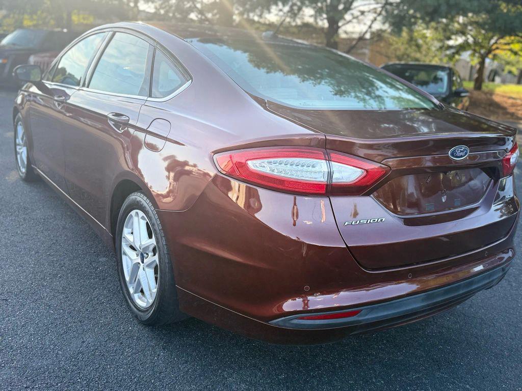 used 2015 Ford Fusion car, priced at $5,500