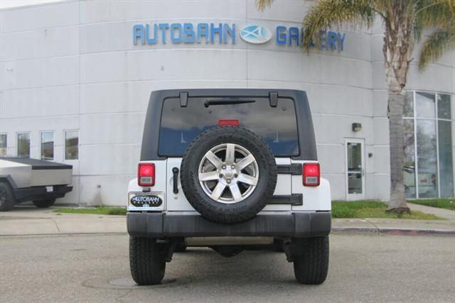 used 2018 Jeep Wrangler JK Unlimited car, priced at $21,888