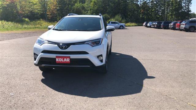 used 2018 Toyota RAV4 Hybrid car, priced at $25,295
