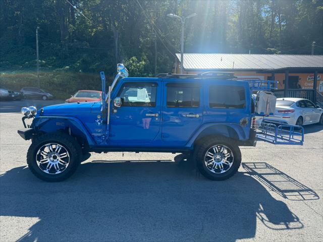 used 2011 Jeep Wrangler Unlimited car, priced at $22,800