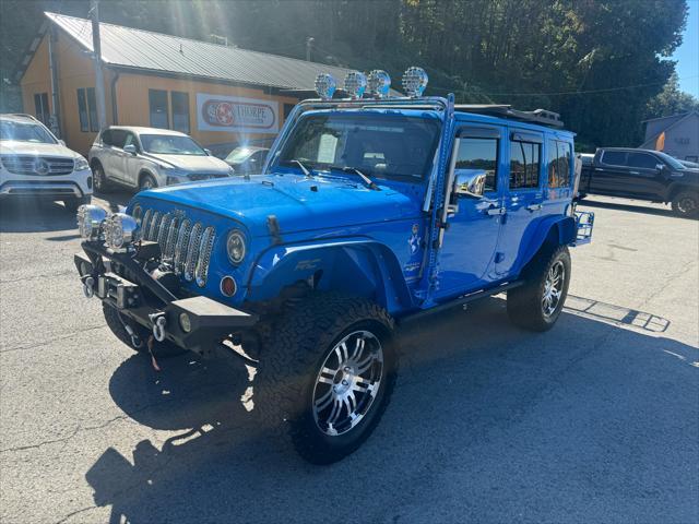 used 2011 Jeep Wrangler Unlimited car, priced at $22,800