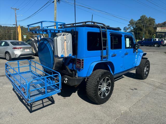 used 2011 Jeep Wrangler Unlimited car, priced at $22,800