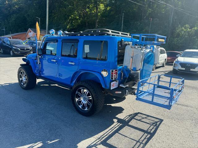 used 2011 Jeep Wrangler Unlimited car, priced at $22,800