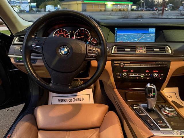 used 2011 BMW 750 car, priced at $9,999