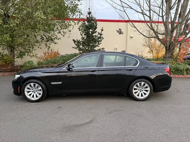 used 2011 BMW 750 car, priced at $9,999