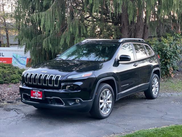 used 2014 Jeep Cherokee car, priced at $17,499