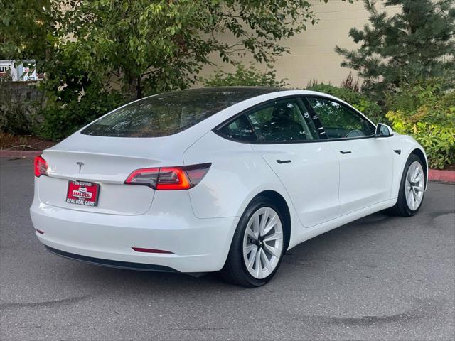 used 2023 Tesla Model 3 car, priced at $26,999