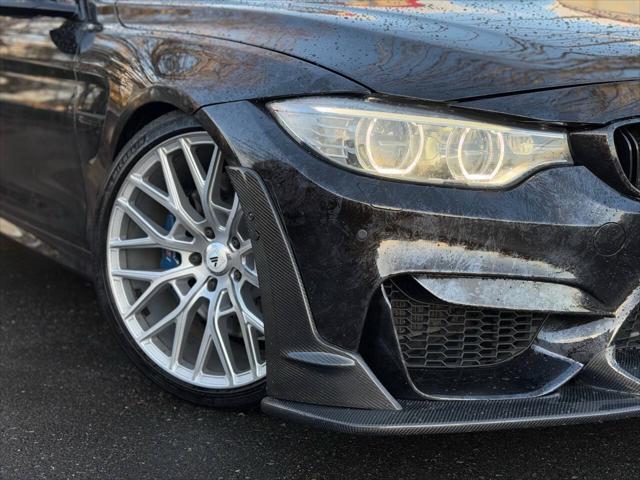 used 2015 BMW M4 car, priced at $42,999