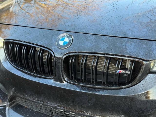 used 2015 BMW M4 car, priced at $42,999