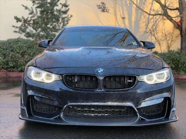 used 2015 BMW M4 car, priced at $42,999