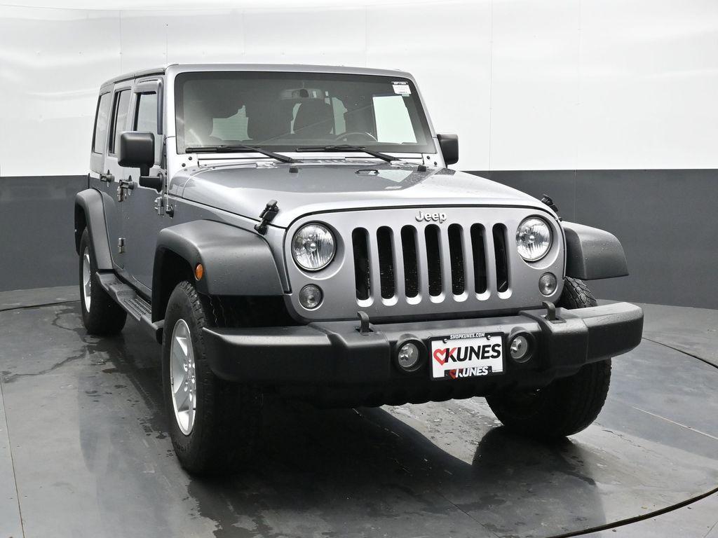 used 2015 Jeep Wrangler Unlimited car, priced at $14,370