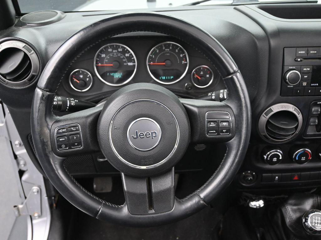 used 2015 Jeep Wrangler Unlimited car, priced at $11,187