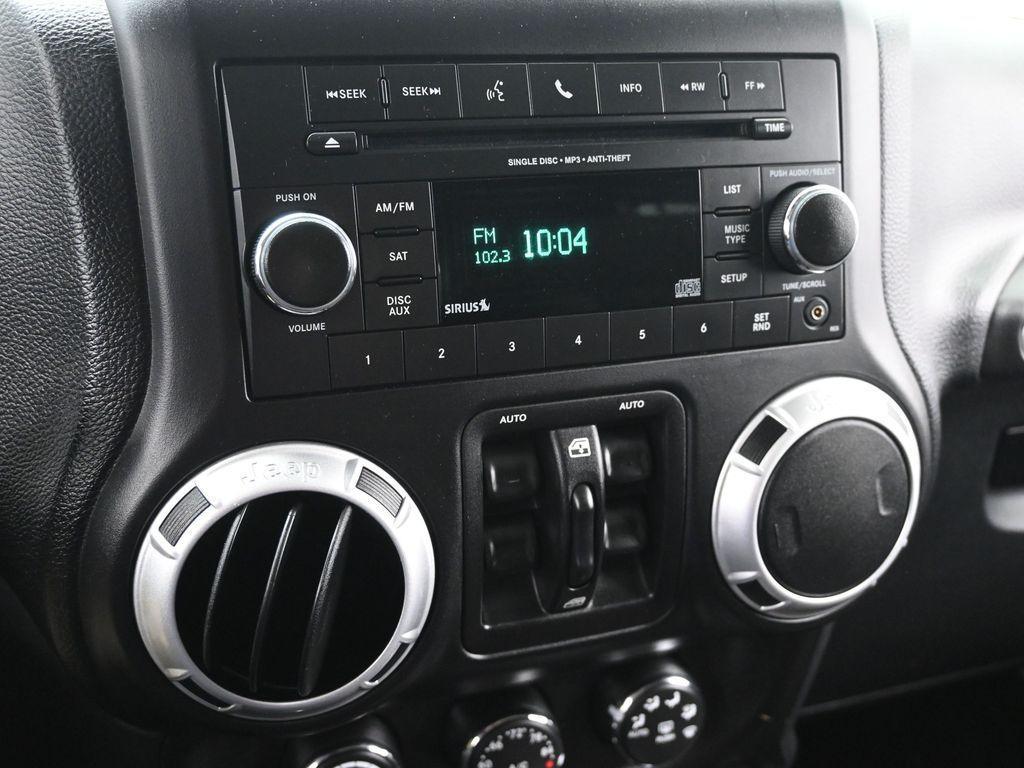 used 2012 Jeep Wrangler Unlimited car, priced at $19,435