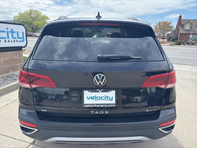 used 2024 Volkswagen Taos car, priced at $23,595