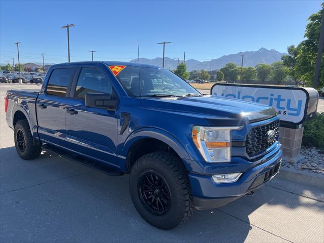 used 2022 Ford F-150 car, priced at $34,999